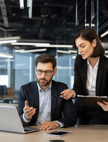 Professional consultants collaborating at RTO Guide office